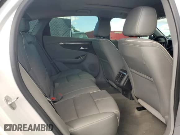 2017 Chevrolet Impala Premier z VIN 2G1145S32H9145788, wystawiony jako Copart lot #87188465 z przebiegiem 77 672 mil mil oraz Szkoda całkowita • Salvage title. Historia ofert i sprzedaży dostępna na DreamBid. Obrazek 10.