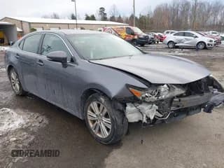 ✅ 2014 Lexus ES 330 • VIN: JTHBK1GG0E2113100 • Lot: 41309816. Listed on IAAI with 233,535 mi. Free auction sales archive from the USA and detailed vehicle history report at DreamBid. Image 1.