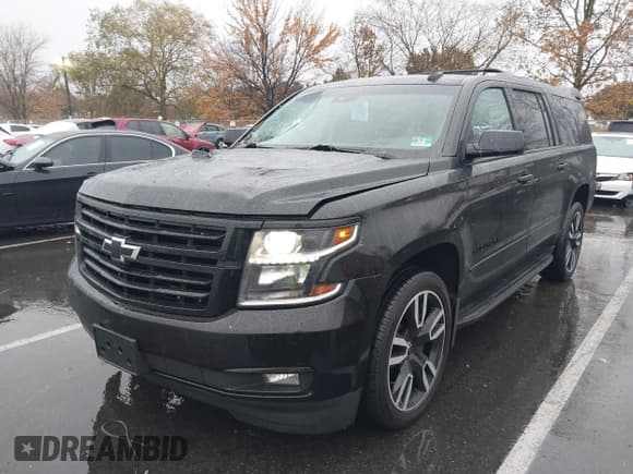 ✅ 2018 Chevrolet Suburban Premier • VIN: 1GNSKJKC7JR184079 • Lot: 43567552. Listed on IAAI with 84,957 mi. Free auction sales archive from the USA and detailed vehicle history report at DreamBid. Image 2.