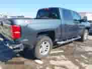 2018 Chevrolet Silverado 1500 LT z VIN 3GCUKREC4JG292008, wystawiony jako IAAI lot #43370209 z przebiegiem 96 545 mil mil oraz . Historia ofert i sprzedaży dostępna na DreamBid. Obrazek 4.