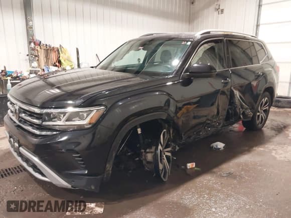✅ 2021 Volkswagen Atlas SEL Premium • VIN: 1V2TR2CAXMC577785 • Lot: 41613198. Wystawiony na IAAI z przebiegiem 81 712 mil. Bezpłatny archiwum sprzedaży aukcyjnych z USA i szczegółowy raport historii pojazdu na DreamBid. Zdjęcie 18.