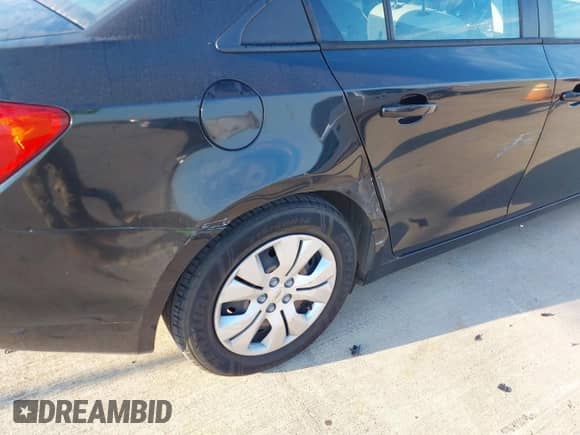 2014 Chevrolet Cruze LS with VIN 1G1PA5SH3E7487276, listed as a IAAI auction lot 43405712 with 188,002 mi miles and . Bid and sale history available at DreamBid. Image 6.