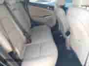 2018 Hyundai Tucson Limited with VIN KM8J33A23JU766971, listed as a IAAI auction lot 41812115 with 127,693 mi miles and . Bid and sale history available at DreamBid. Image 8.