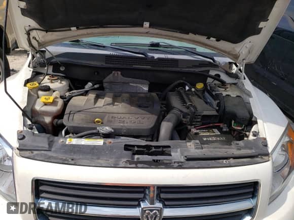 2007 Dodge Caliber SXT z VIN 1B3HB48B27D564683, wystawiony jako Copart lot #73495424 z przebiegiem 88 463 mil mil oraz Nie do naprawy • Non repairable. Historia ofert i sprzedaży dostępna na DreamBid. Obrazek 12.