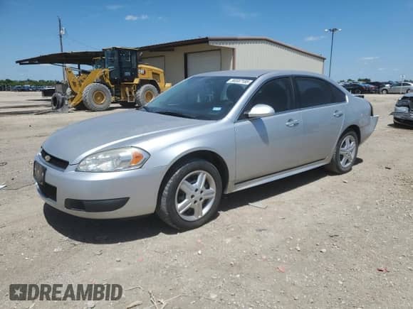 2014 Chevrolet Impala Police Police with VIN 2G1WD5E37E1180502, listed as a Copart auction lot 56597185 with 84,426 mi miles and Salvage title. Bid and sale history available at DreamBid. Image 1.