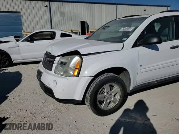2007 Chevrolet Equinox LS z VIN 2CNDL13F976247044, wystawiony jako Copart lot #76099004 z przebiegiem 92 888 mil mil oraz Szkoda całkowita • Salvage title. Historia ofert i sprzedaży dostępna na DreamBid. Obrazek 11.