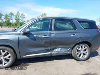 2022 Hyundai Palisade Limited z VIN KM8R54HE1NU405988, wystawiony jako IAAI lot #43269990 z przebiegiem 51 201 mil mil oraz . Historia ofert i sprzedaży dostępna na DreamBid. Obrazek 6.