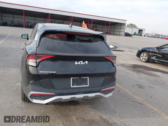 ✅ 2023 Kia Sportage EX • VIN: 5XYK33AF0PG090999 • Lot: 43211857. Listed on IAAI with 26,951 mi. Free auction sales archive from the USA and detailed vehicle history report at DreamBid. Image 17.
