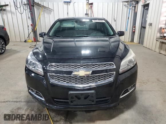 ✅ 2013 Chevrolet Malibu LTZ • VIN: 1G11J5SX6DF349359 • Lot: 85578835. Listed on Copart with 140,851 mi. Free auction sales archive from the USA and detailed vehicle history report at DreamBid. Image 5.