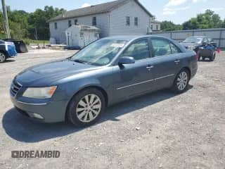 2009 Hyundai Sonata SE with VIN 5NPEU46F59H477701, listed as a Copart auction lot 63563825 with 153,258 mi miles and Salvage title. Bid and sale history available at DreamBid. Image 1.