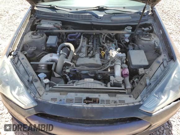 2014 Hyundai Genesis Coupe R-Spec z VIN KMHHT6KD8EU116958, wystawiony jako Copart lot #54617405 z przebiegiem 118 024 mil mil oraz Czysty tytuł • Clean title. Historia ofert i sprzedaży dostępna na DreamBid. Obrazek 11.