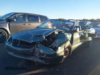 ✅ 1997 Chrysler Sebring JX • VIN: 3C3EL45HXVT541865 • Лот: 43522312. Опубликован ранее на IAAI с пробегом 147 806 миль. Бесплатный доступ к архиву аукционных продаж из США и подробный отчёт об истории автомобиля на DreamBid. Изображение 2.