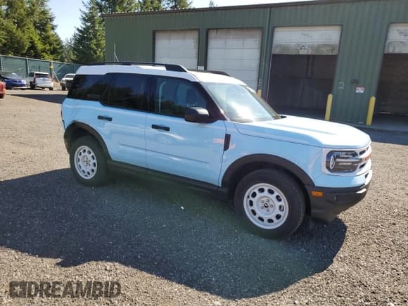 ✅ 2023 Ford Bronco Sport Heritage • VIN: 3FMCR9G6XPRD83114 • Lot: 81342195. Listed on Copart with 30,267 mi. Free auction sales archive from the USA and detailed vehicle history report at DreamBid. Image 4.