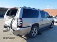 ✅ 2007 Chevrolet Suburban LTZ • VIN: 3GNFC16J57G103628 • Lot: 42373026. Listed on IAAI with 293,570 mi. Free auction sales archive from the USA and detailed vehicle history report at DreamBid. Image 4.