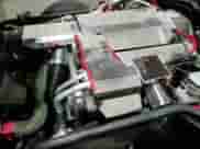 1996 Chevrolet Corvette z VIN 1G1YY22P5T5100550, wystawiony jako Copart lot #83613084 z przebiegiem 69 401 mil mil oraz Szkoda całkowita • Salvage title. Historia ofert i sprzedaży dostępna na DreamBid. Obrazek 13.