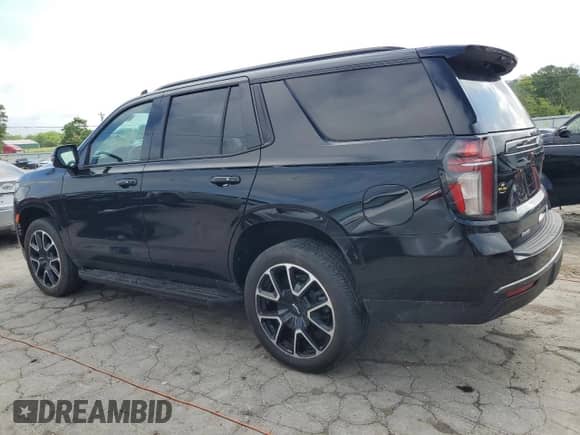 2021 Chevrolet Tahoe RST with VIN 1GNSKRKT7MR318446, listed as a Copart auction lot 54986494 with 8,173 mi miles and . Bid and sale history available at DreamBid. Image 2.