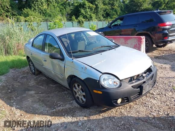 2004 Dodge Neon SXT z VIN 1B3ES56C94D630937, wystawiony jako IAAI lot #42802887 z przebiegiem 146 274 mil mil oraz . Historia ofert i sprzedaży dostępna na DreamBid. Obrazek 1.