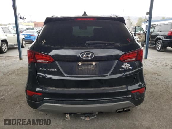✅ 2018 Hyundai Santa Fe 2.0T • VIN: 5NMZU4LA2JH075999 • Лот: 39291514. Опубликован ранее на Copart с пробегом 51 132 миль. Бесплатный доступ к архиву аукционных продаж из США и подробный отчёт об истории автомобиля на DreamBid. Изображение 6.