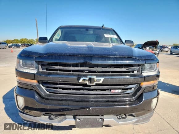 ✅ 2018 Chevrolet Silverado 1500 LT • VIN: 3GCUKREC5JG164974 • Лот: 90520345. Опубликован ранее на Copart с пробегом 171 279 миль. Бесплатный доступ к архиву аукционных продаж из США и подробный отчёт об истории автомобиля на DreamBid. Изображение 5.