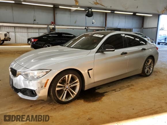 ✅ 2015 BMW 4 Series 428i • VIN: WBA4A5C51FG052009 • Lot: 89110235. Listed on Copart with 156,675 mi. Free auction sales archive from the USA and detailed vehicle history report at DreamBid. Image 1.