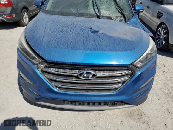 2018 Hyundai Tucson Limited z VIN KM8J33A20JU793089, wystawiony jako Copart lot #76199034 z przebiegiem 79 954 mil mil oraz Szkoda całkowita • Salvage title. Historia ofert i sprzedaży dostępna na DreamBid. Obrazek 12.