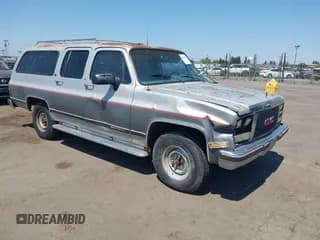 ✅ 1990 GMC Suburban • VIN: 1GKGR26N2LF512013 • Lot: 42982615. Wystawiony na IAAI z przebiegiem 158 012 mil. Bezpłatny archiwum sprzedaży aukcyjnych z USA i szczegółowy raport historii pojazdu na DreamBid. Zdjęcie 1.