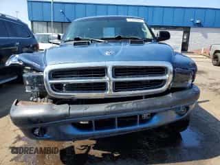 2002 Dodge Dakota Sport z VIN 1B7GG32NX2S616395, wystawiony jako Copart lot #70294944 z przebiegiem 205 067 mil mil oraz Czysty tytuł • Clean title. Historia ofert i sprzedaży dostępna na DreamBid. Obrazek 5.