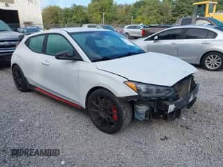 2019 Hyundai Veloster N z VIN KMHT36AH0KU001538, wystawiony jako IAAI lot #43193750 z przebiegiem 61 712 mil mil oraz . Historia ofert i sprzedaży dostępna na DreamBid. Obrazek 1.