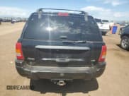 ✅ 2000 Jeep Grand Cherokee Laredo • VIN: 1J4GW48N0YC210235 • Lot: 60558905. Listed on Copart with 131,108 mi. Free auction sales archive from the USA and detailed vehicle history report at DreamBid. Image 6.