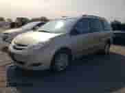 2009 Toyota Sienna LE with VIN 5TDBK23C49S026695, listed as a Copart auction lot 59058435 with 324,336 mi miles and Clean title. Bid and sale history available at DreamBid. Image 1.