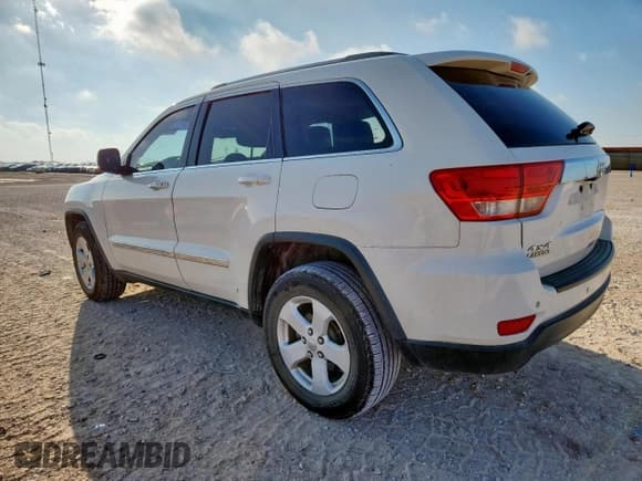 ✅ 2011 Jeep Grand Cherokee Laredo • VIN: 1J4RR4GG6BC734709 • Lot: 72073615. Listed on Copart with 218,198 mi. Free auction sales archive from the USA and detailed vehicle history report at DreamBid. Image 2.