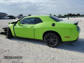 ✅ 2023 Dodge Challenger SXT • VIN: 2C3CDZAG9PH571143 • Lot: 67276504. Wystawiony na Copart z przebiegiem 14 086 mil. Bezpłatny archiwum sprzedaży aukcyjnych z USA i szczegółowy raport historii pojazdu na DreamBid. Zdjęcie 2.