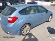 ✅ 2012 Subaru Impreza Premium • VIN: JF1GPAE67CH230918 • Lot: 43383808. Listed on IAAI with 124,512 mi. Free auction sales archive from the USA and detailed vehicle history report at DreamBid. Image 4.