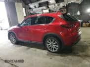 ✅ 2020 Mazda CX-5 Grand Touring Reserve • VIN: JM3KFBAY8L0745453 • Lot: 87057935. Listed on Copart with 80,142 mi. Free auction sales archive from the USA and detailed vehicle history report at DreamBid. Image 2.