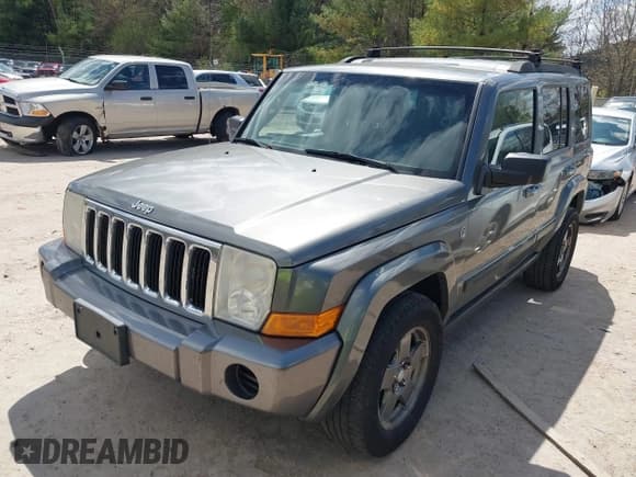 ✅ 2007 Jeep Commander Sport • VIN: 1J8HG48P87C647870 • Lot: 42185954. Listed on IAAI with 269,402 mi. Free auction sales archive from the USA and detailed vehicle history report at DreamBid. Image 2.