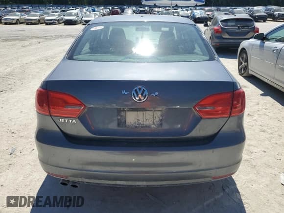 ✅ 2013 Volkswagen Jetta • VIN: 3VW2K7AJ5DM401577 • Lot: 82443985. Wystawiony na Copart z przebiegiem Nie podano. Bezpłatny archiwum sprzedaży aukcyjnych z USA i szczegółowy raport historii pojazdu na DreamBid. Zdjęcie 6.