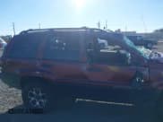 ✅ 2000 Jeep Grand Cherokee Laredo • VIN: 1J4GW48S3YC123936 • Lot: 43401954. Listed on IAAI with Not provided. Free auction sales archive from the USA and detailed vehicle history report at DreamBid. Image 14.