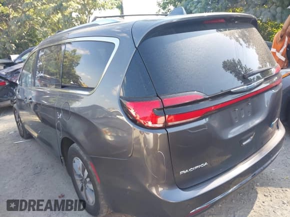 ✅ 2021 Chrysler Pacifica Hybrid Touring L • VIN: 2C4RC1L79MR602839 • Лот: 42745473. Опубликован ранее на IAAI с пробегом 101 174 миль. Бесплатный доступ к архиву аукционных продаж из США и подробный отчёт об истории автомобиля на DreamBid. Изображение 3.