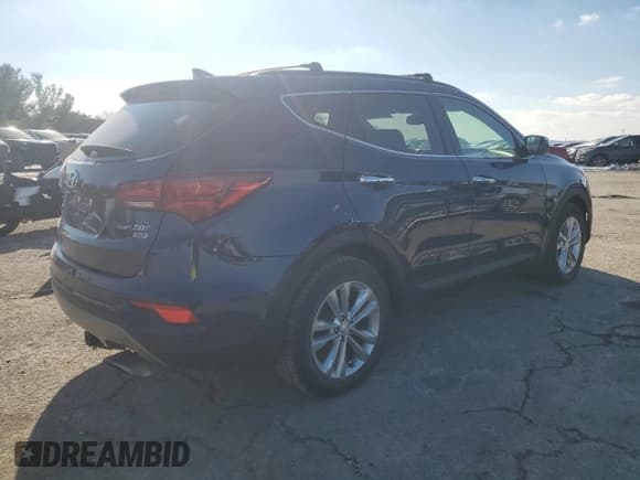 ✅ 2018 Hyundai Santa Fe Limited • VIN: 5XYZUDLA3JG513522 • Лот: 42084235. Опубликован ранее на Copart с пробегом 77 727 миль. Бесплатный доступ к архиву аукционных продаж из США и подробный отчёт об истории автомобиля на DreamBid. Изображение 3.