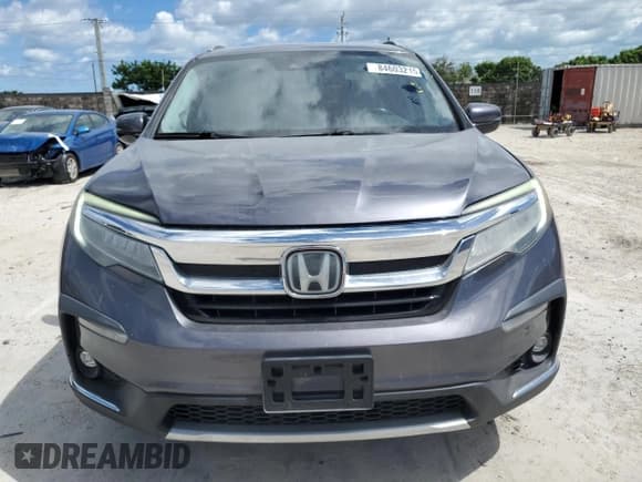✅ 2021 Honda Pilot Touring 8-Passenger • VIN: 5FNYF6H96MB012412 • Lot: 84603215. Listed on Copart with 123,183 mi. Free auction sales archive from the USA and detailed vehicle history report at DreamBid. Image 5.
