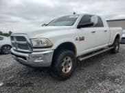 ✅ 2013 Ram 2500 Laramie • VIN: 3C6UR5NL1DG592444 • Lot: 67356395. Listed on Copart with 195,885 mi. Free auction sales archive from the USA and detailed vehicle history report at DreamBid. Image 1.