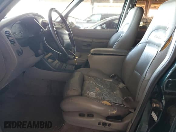 1995 Ford Explorer XL with VIN 1FMDU32X6SZB83058, listed as a Copart auction lot 82404245 with 232,968 mi miles and Salvage title. Bid and sale history available at DreamBid. Image 7.