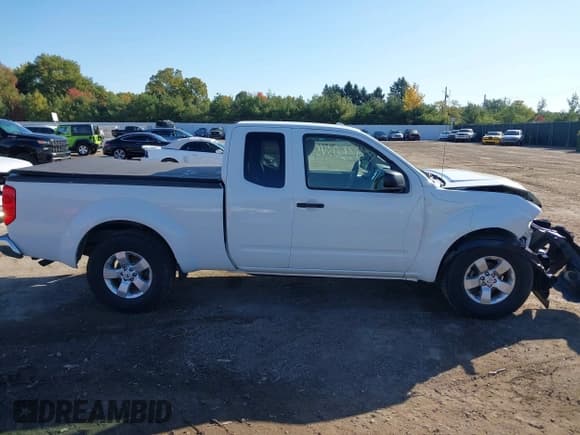 ✅ 2013 Nissan Frontier SV • VIN: 1N6BD0CT1DN737832 • Lot: 43503457. Listed on IAAI with 593,332 mi. Free auction sales archive from the USA and detailed vehicle history report at DreamBid. Image 14.