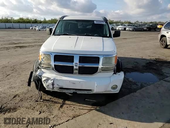 2007 Dodge Nitro SLT с VIN 1D8GU58KX7W681234, выставлен на аукционе Copart как лот 80648224 с пробегом 195 256 миль миль и На запчасти • Non repairable. История ставок и продаж доступна на DreamBid. Изображение 11.
