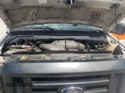 ✅ 2012 Ford Econoline Cargo Commercial • VIN: 1FTNS2EW4CDA86676 • Lot: 57550165. Listed on Copart with 251,780 mi. Free auction sales archive from the USA and detailed vehicle history report at DreamBid. Image 12.