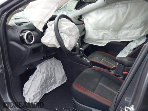 ✅ 2024 Nissan Versa SR • VIN: 3N1CN8FV4RL865086 • Lot: 42710567. Listed on IAAI with 10,701 mi. Free auction sales archive from the USA and detailed vehicle history report at DreamBid. Image 5.