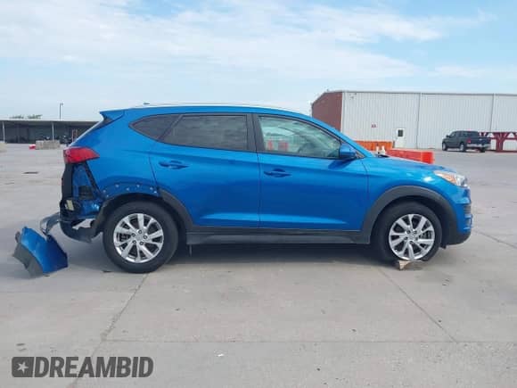 2019 Hyundai Tucson Value with VIN KM8J33A44KU957253, listed as a IAAI auction lot 42887799 with 57,676 mi miles and . Bid and sale history available at DreamBid. Image 13.