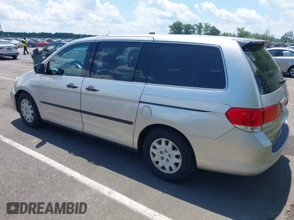 ✅ 2008 Honda Odyssey LX • VIN: 5FNRL382X8B056904 • Lot: 42530609. Listed on IAAI with 238,793 mi. Free auction sales archive from the USA and detailed vehicle history report at DreamBid. Image 3.