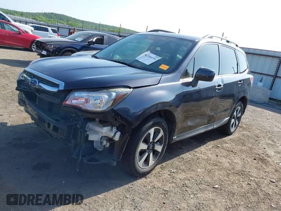 2017 Subaru Forester Limited with VIN JF2SJALC1HH513550, listed as a IAAI auction lot 42266191 with 98,351 mi miles and . Bid and sale history available at DreamBid. Image 18.