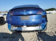 ✅ 2022 Tesla Model Y Performance • VIN: 7SAYGDEFXNF404308 • Lot: 90508845. Wystawiony na Copart z przebiegiem 49 334 mil. Bezpłatny archiwum sprzedaży aukcyjnych z USA i szczegółowy raport historii pojazdu na DreamBid. Zdjęcie 6.